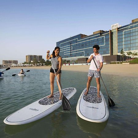Fairmont Bab Al Bahr Hotel Abu Dhabi Bagian luar foto Stand Up Paddle Boarding at Jumeirah Beach Hotel